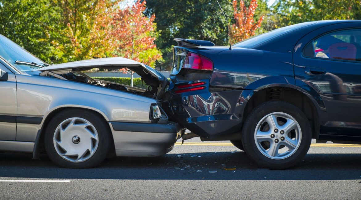 Damaged vehicles after a car collision on a Texas highway
