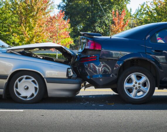 Damaged vehicles after a car collision on a Texas highway