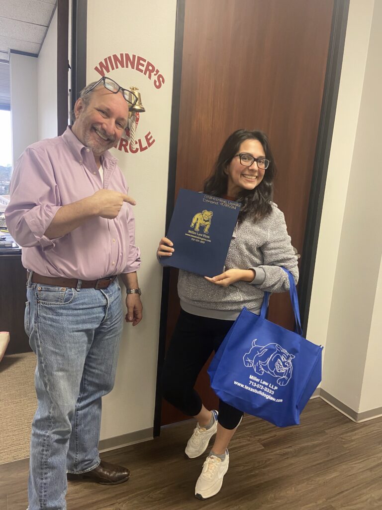 Another satisfied client celebrates their win with The Texas Bulldog Law Firm.