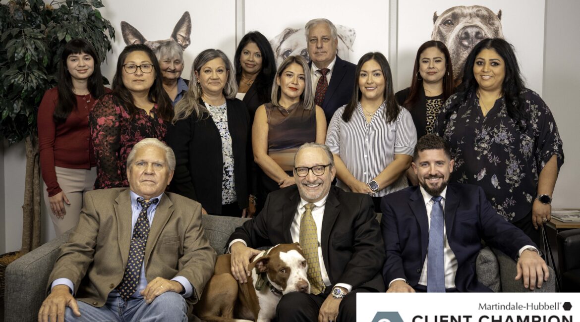 The Miller Law Firm team in Houston with Attorney Adam Miller and McLovin, featured with the Martindale-Hubbell Client Champion Silver Award 2025.