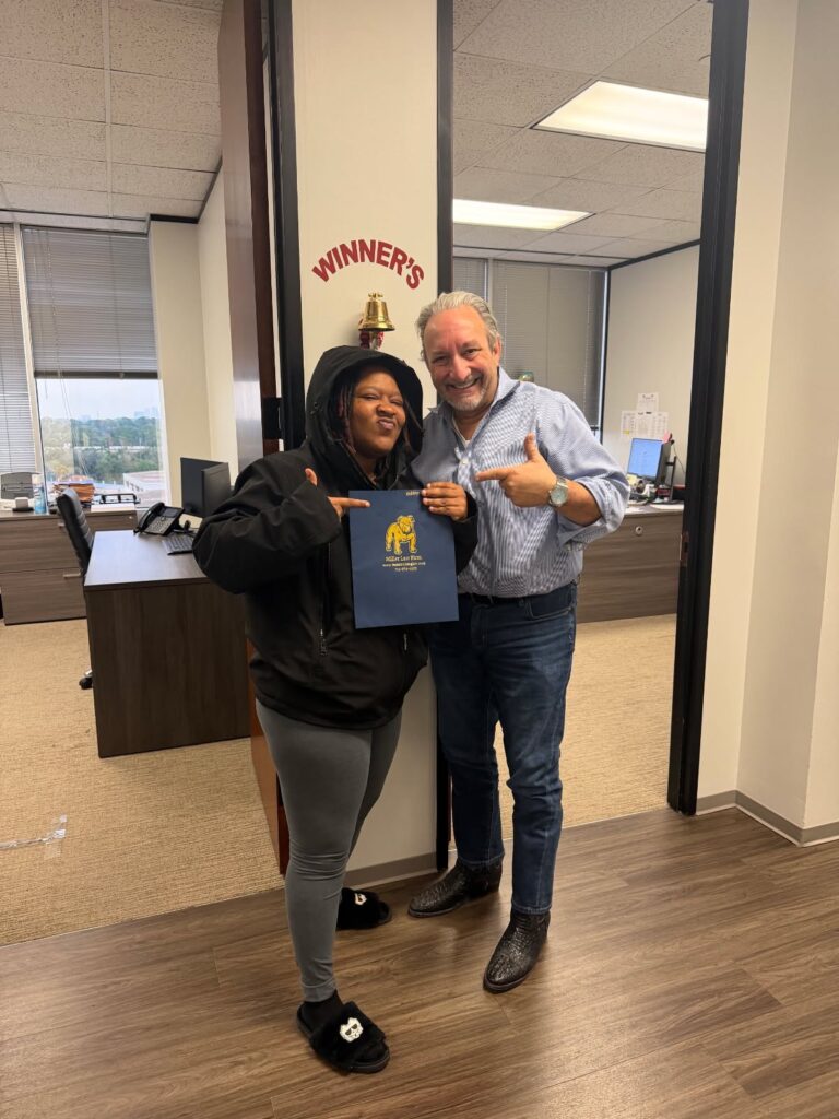 Grateful client celebrating legal victory after accident