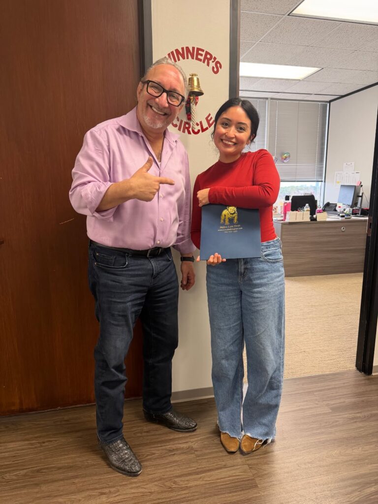 Client celebrating compensation after Houston accident