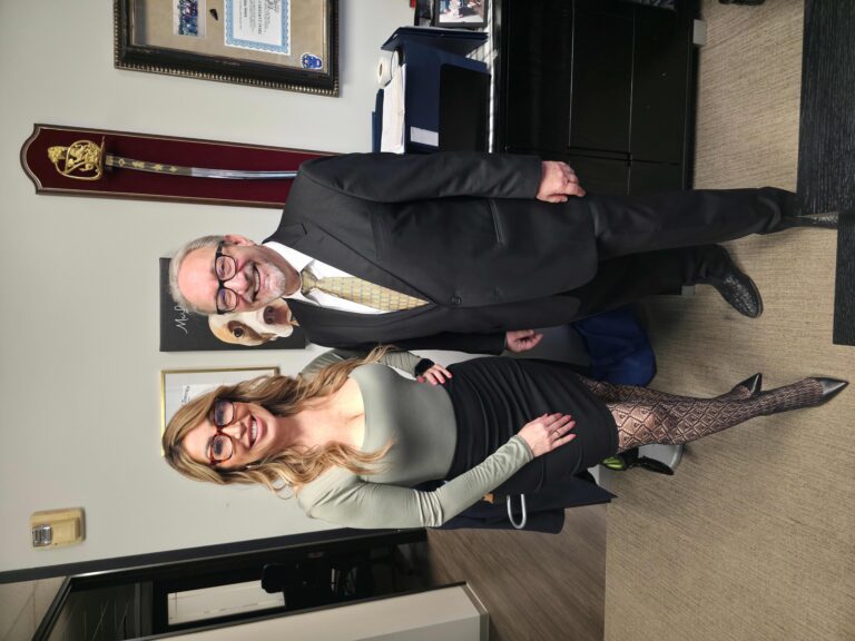 Adam H. Miller, The Texas Bulldog, with Houston social media personality Houston's LaLa at The Miller Law Firm office in Houston, Texas